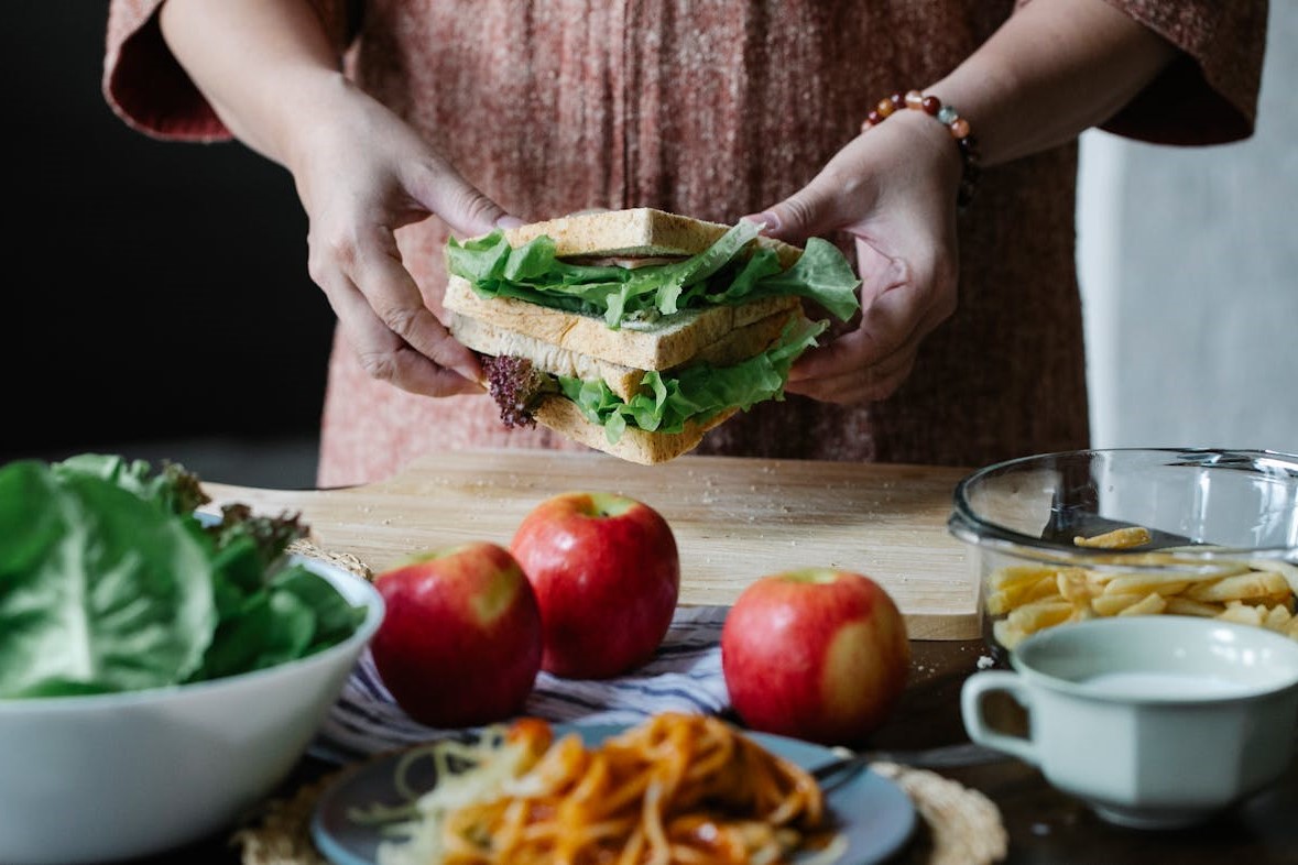 Photo by Alex Green: https://www.pexels.com/photo/crop-woman-with-sandwich-in-hands-5692286/