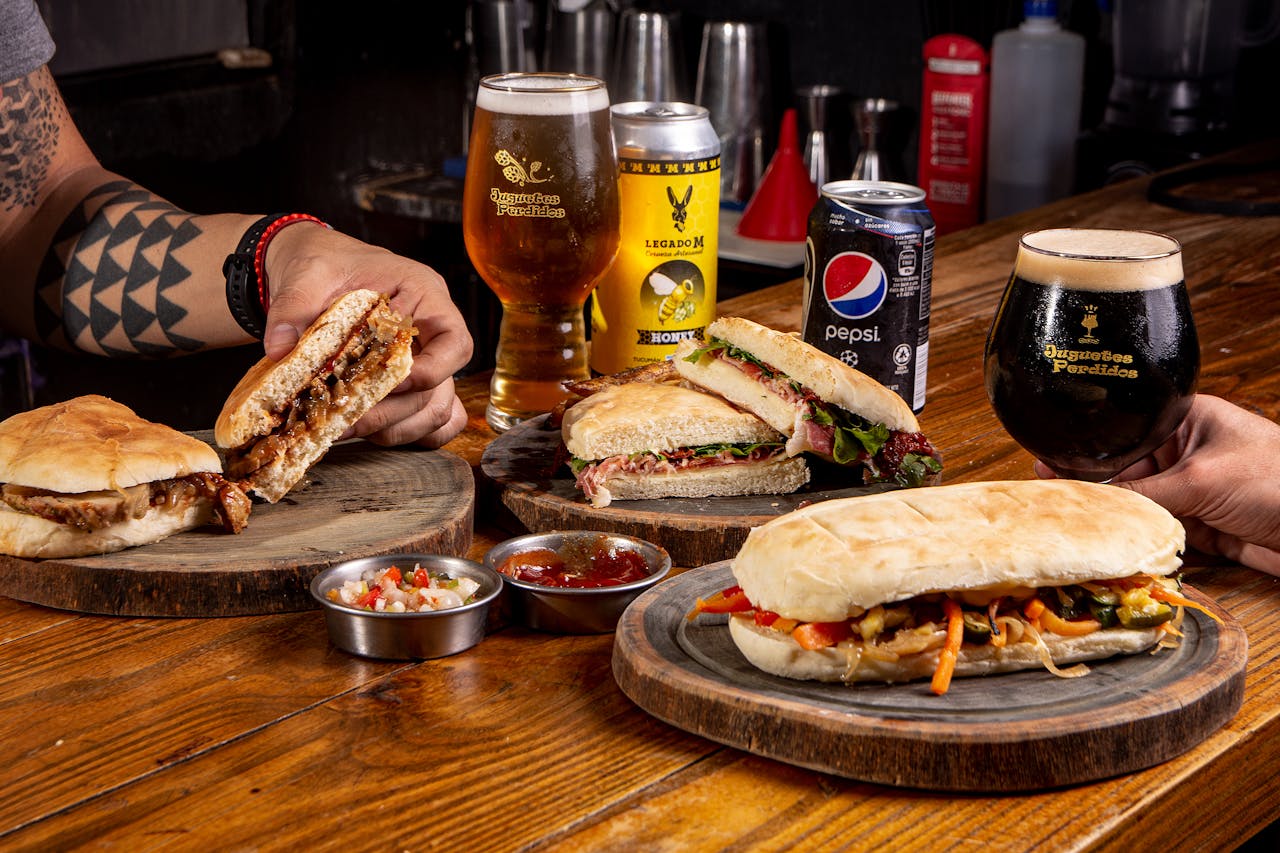 Photo by Gonzalo Acuña: https://www.pexels.com/photo/sandwiches-and-beers-on-wooden-table-12664774/