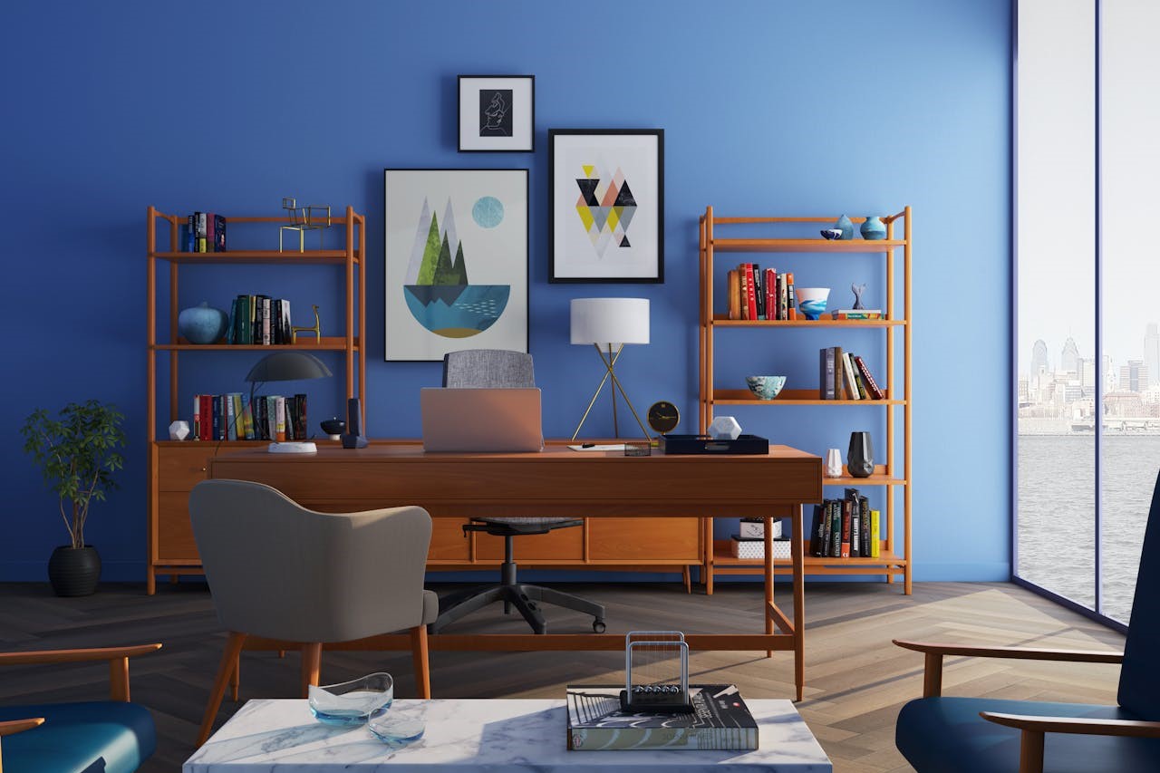 Photo by Kemaleddin Novruzlu: https://www.pexels.com/photo/brown-wooden-desk-with-rolling-chair-and-shelves-near-window-667838/