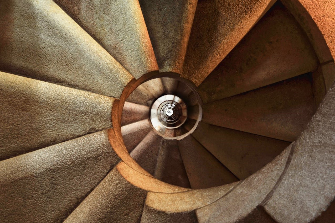 Photo by Pixabay: https://www.pexels.com/photo/spiral-staircase-39656/