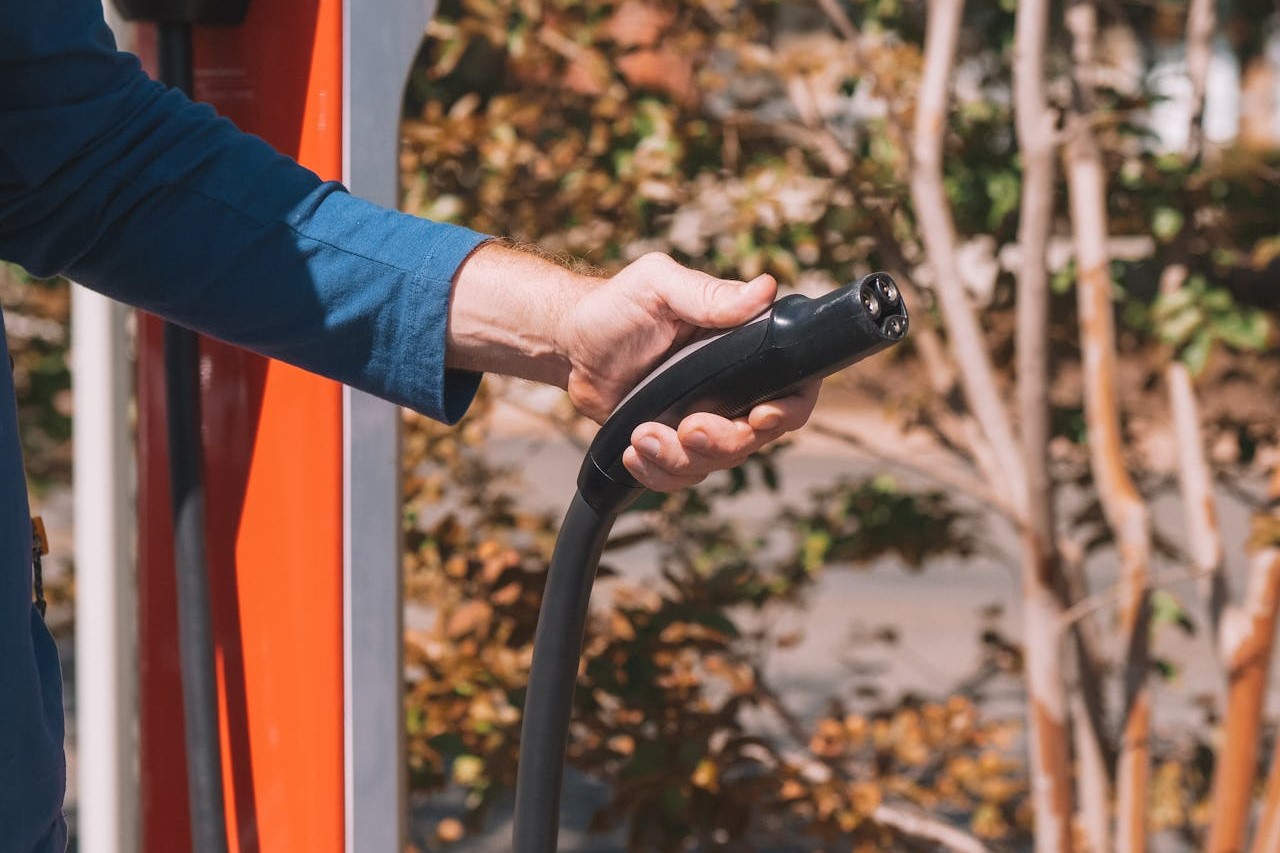 Photo by Kindel Media: https://www.pexels.com/photo/person-holding-black-car-steering-wheel-9799732/